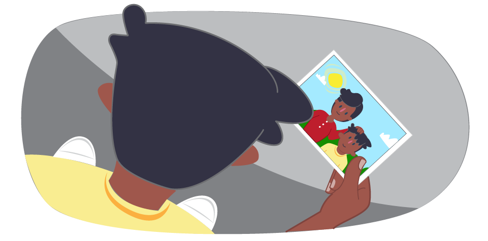 Child looking at  photo of someone who has died