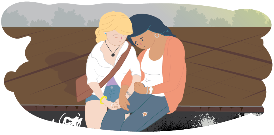 Teen comforting her friend, who is very sad